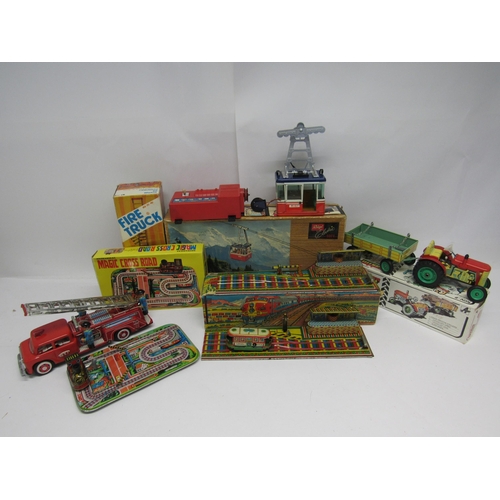 7084 - A group of boxed tinplate mechanical toys to include Lehmann (Germany) battery operated Rigi 900E ca... 