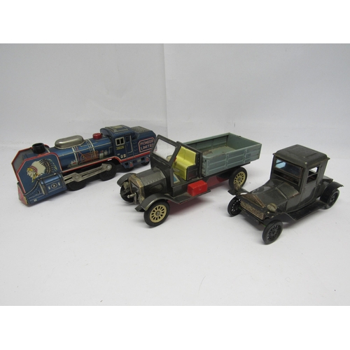 7182 - Three Japanese friction drive tinplate vehicles to include delivery truck with folding windscreen, B... 