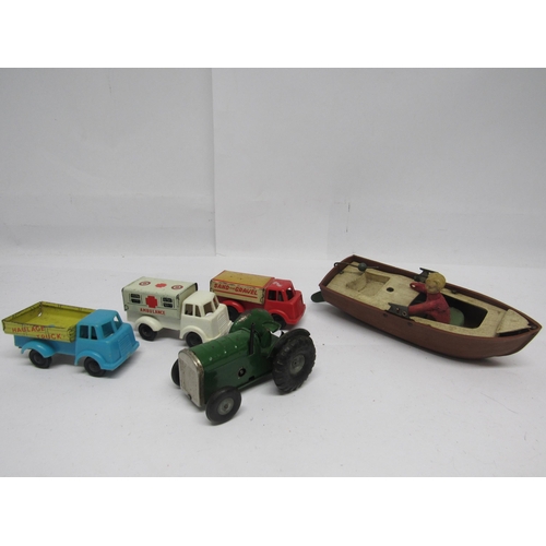 7089 - Two playworn Triang Minic clockwork toys to include Farm Tractor in green and Jack In The Boat rowin... 