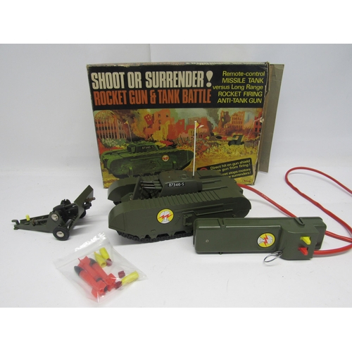 7077 - A Triang Minic M310 Shoot Or Surrender! Rocket Gun & Tank Battle Set, comprising M301 rocket firing ... 