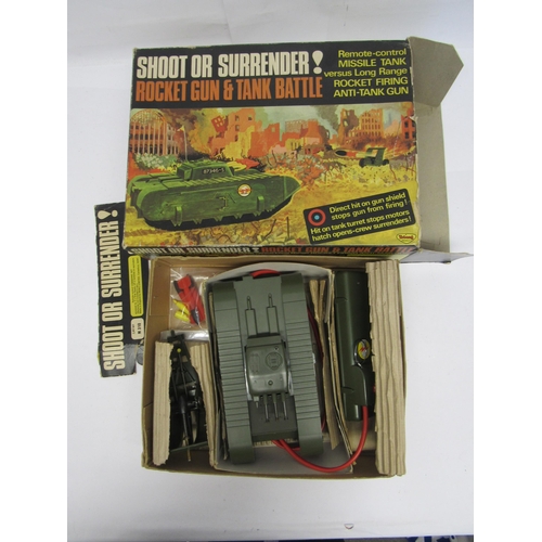 7077 - A Triang Minic M310 Shoot Or Surrender! Rocket Gun & Tank Battle Set, comprising M301 rocket firing ... 