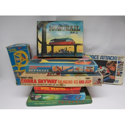 7061 - A collection of vintage toys and games to include Cosmo battery operated Monorail, Russian battery o... 