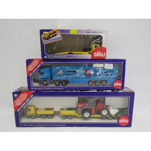 7238 - Three boxed Siku Super Series 1:55 scale diecast commercial vehicles to include 4113 low loader with... 