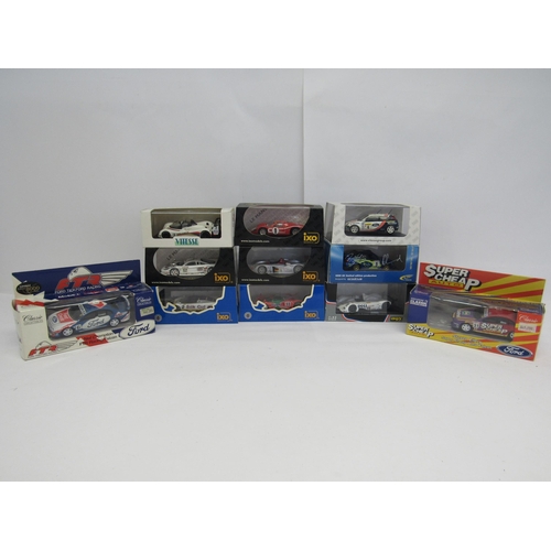 7244A - Five cased Ixo diecast model racing cars to include LM1988 Jaguar XJR-9 Winner Le Mans 1988 (spoiler... 