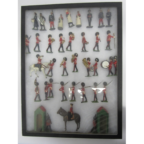 7197 - A collection of Bitains hand painted lead figures including Salvation Army woman with tambourine, mi... 