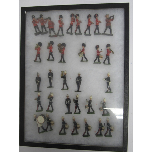 7194 - A collection of Britains hand painted lead figures of military bandsmen and guardsmen (approx. 33), ... 