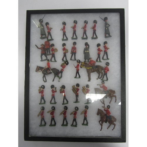 7199 - A collection of Britains hand painted lead figures of mounted and foot bandsmen and guardsmen (appro... 