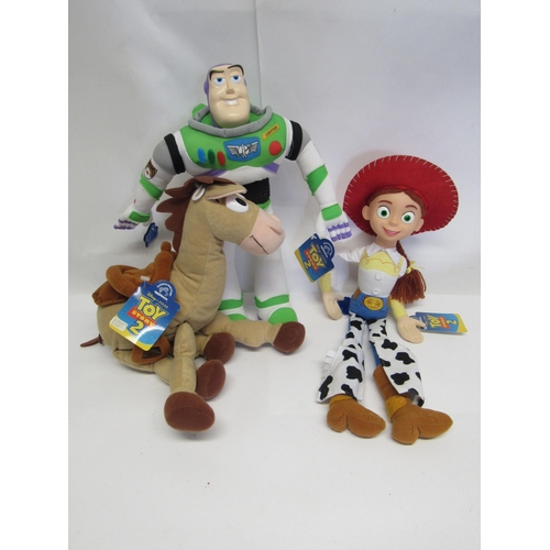 7064 - Three Toy Story 2 soft toys by Applause, to include Buzz Lightyear, Jessie and Bullseye, together wi... 