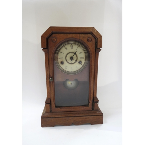 4087 - A late Victorian cottage clock, Roman numeral dial, Pat. July 30th 1878 to face, worn. 39cm high