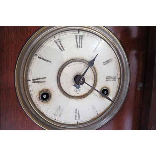 4087 - A late Victorian cottage clock, Roman numeral dial, Pat. July 30th 1878 to face, worn. 39cm high