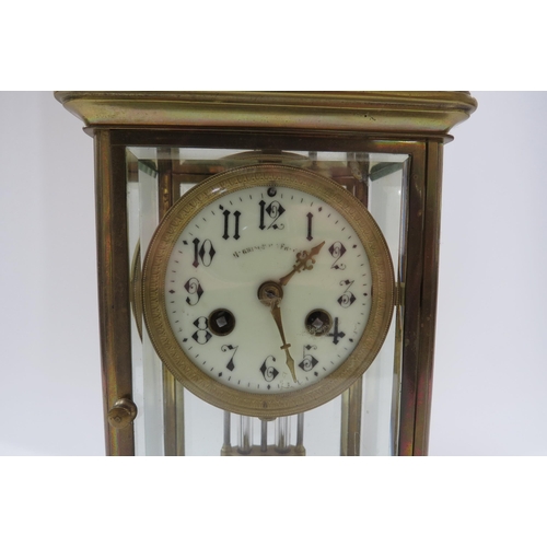 4168 - A four glass French two train mantel clock with mercury pendulum. Striking on a coiled gong. 22.5cm ... 