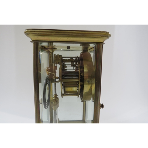 4168 - A four glass French two train mantel clock with mercury pendulum. Striking on a coiled gong. 22.5cm ... 