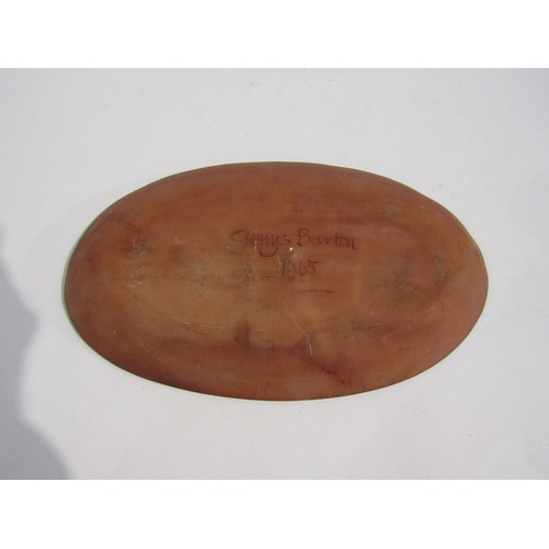 7096 - GLENYS BARTON (b.1944) A very early slipware oval dish with floral design. Signed underneath and dat... 