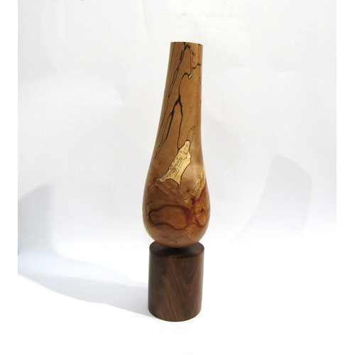 7543 - RICHARD CHAPMAN (b.1951) A Walnut and Spalted Beech sculptural vessel, turned Beech tapering form on... 