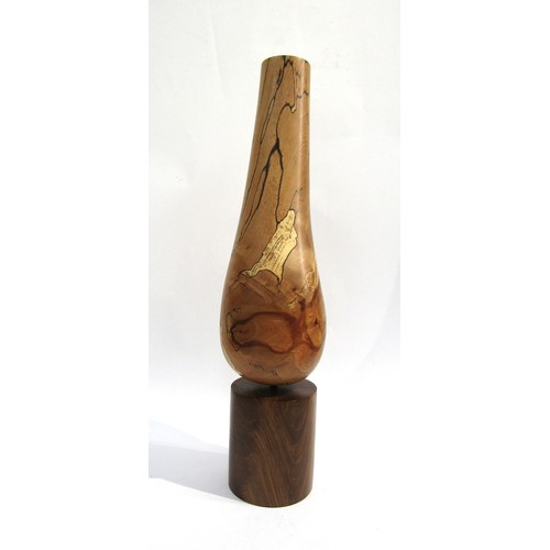 7543 - RICHARD CHAPMAN (b.1951) A Walnut and Spalted Beech sculptural vessel, turned Beech tapering form on... 