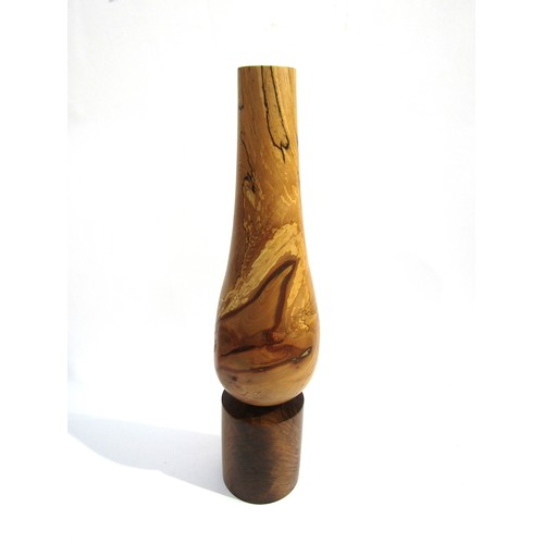 7543 - RICHARD CHAPMAN (b.1951) A Walnut and Spalted Beech sculptural vessel, turned Beech tapering form on... 