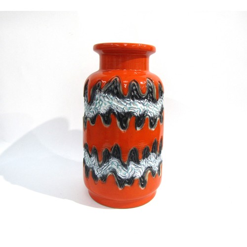 7013 - A Dumler & Breiden West German floor vase with orange glaze and two horizontal waved bands of textur... 