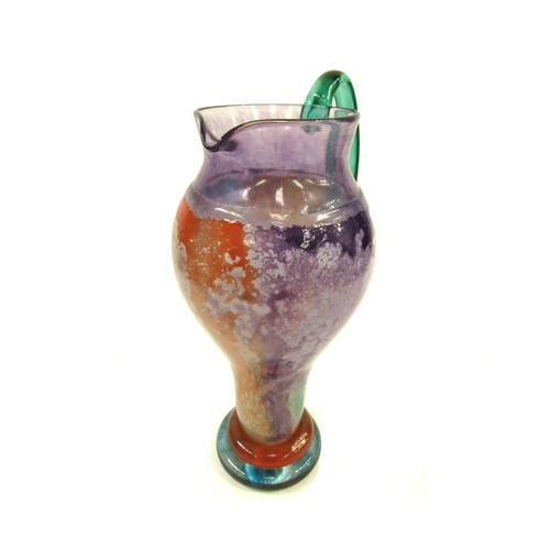 7223 - A Kosta Boda 'Can-Can' range pitcher designed by Kjell Engman in mottled orange, blue and purple. La... 