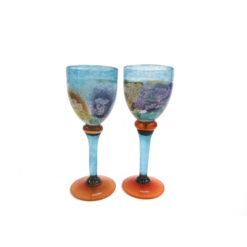 7225 - A Kosta Boda 'Can-Can' range pair of goblets designed by Kjell Engman in mottled orange, blue and pu... 