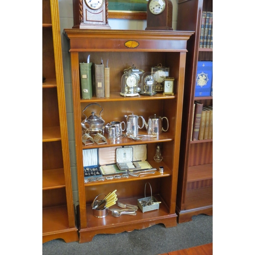 A reproduction bookcase, shell marquetry inlay, four tiers of shelving ...