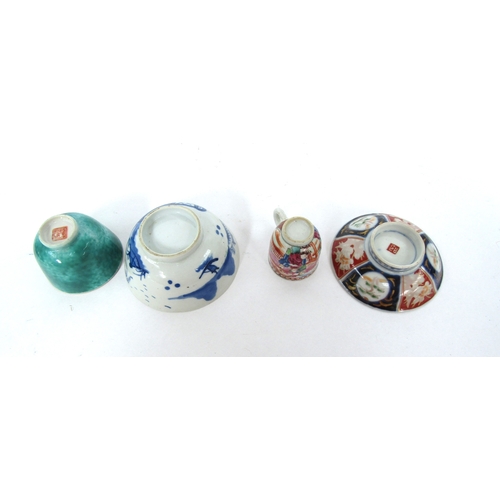 5032 - A late 18th century Chinese Famille Rose small cup, green glazed tea bowl and blue and white items(4... 