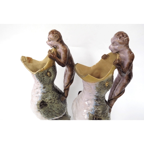 5034 - A pair of William Brownfield majolica jugs in the form of birds with open beaks and monkeys atop as ... 