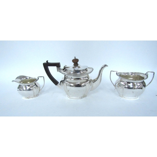 5064 - A silver bachelor’s three piece tea set, Birmingham 1909