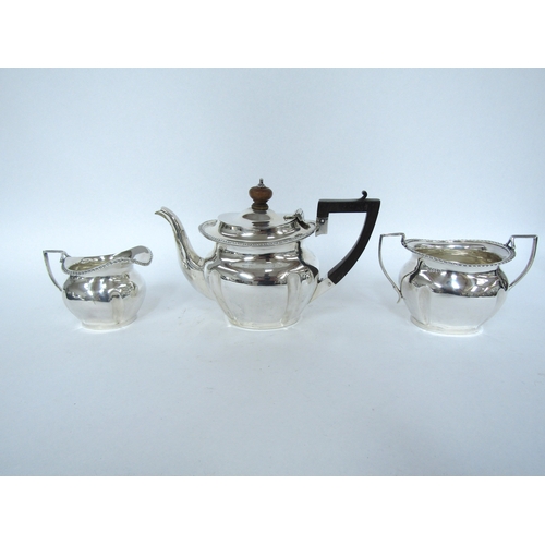 5064 - A silver bachelor’s three piece tea set, Birmingham 1909