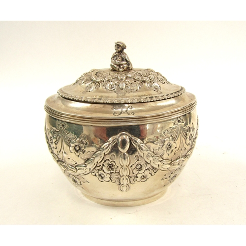 5066 - A silver John Henry Rawlings silver tea caddy, floral decorated with ribbon and swag detail, figural... 