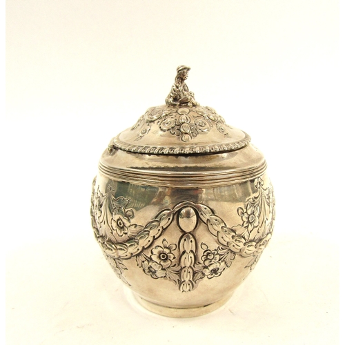 5066 - A silver John Henry Rawlings silver tea caddy, floral decorated with ribbon and swag detail, figural... 