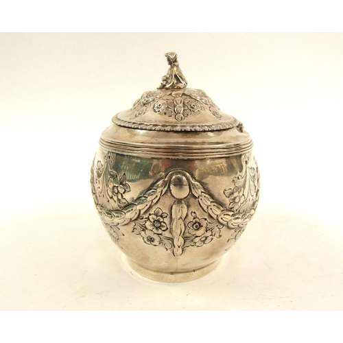 5066 - A silver John Henry Rawlings silver tea caddy, floral decorated with ribbon and swag detail, figural... 