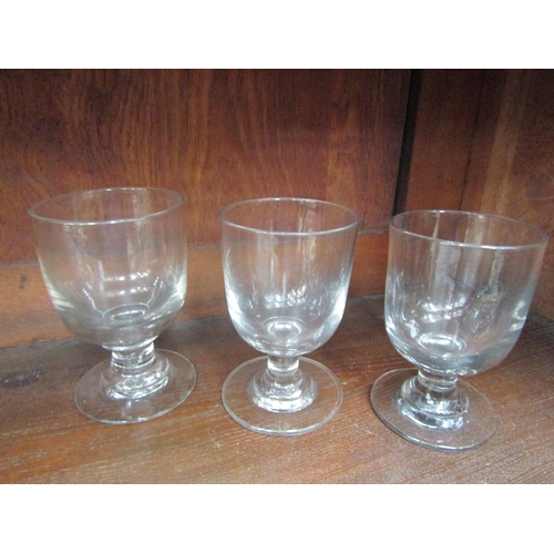 5449 - Three Georgian rummer glasses, one with high lead content, rough pontils, tallest 14.5cm