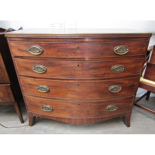 5458 - A George III mahogany bow fronted chest of drawers, brass oval handles, on outswept supports, 98.5cm... 