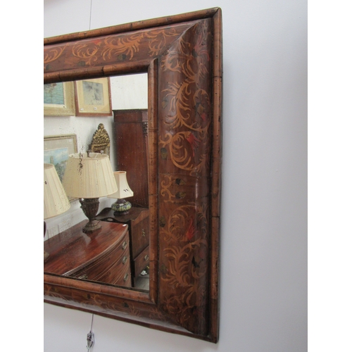 5464 - An 18th Century cushion form marquetry mirror, later mirror plate, 62cm x 58cm