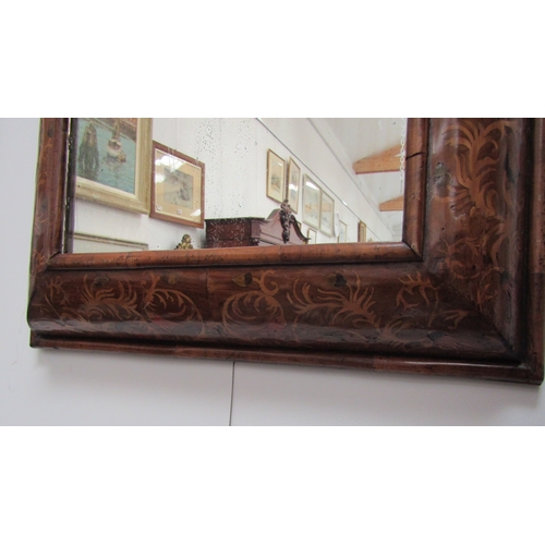 5464 - An 18th Century cushion form marquetry mirror, later mirror plate, 62cm x 58cm