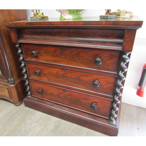 5476 - A Victorian mahogany chest of three drawers with concave cushion drawer,  barley twist coloumn detai... 