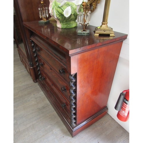 5476 - A Victorian mahogany chest of three drawers with concave cushion drawer,  barley twist coloumn detai... 