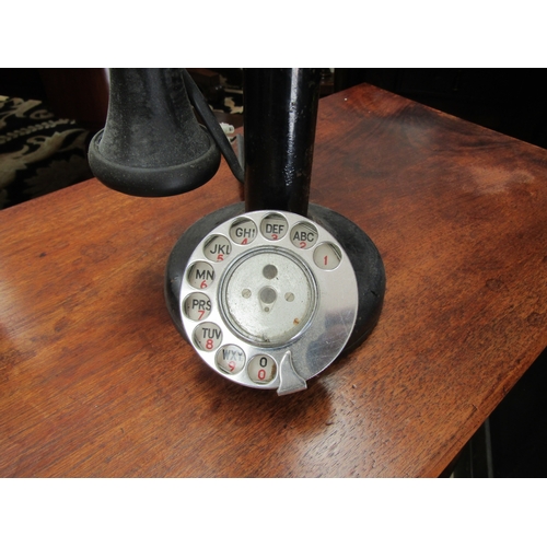 5482 - A vintage Bakelite stick telephone converted into a table lamp