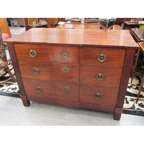 5486 - Circa 1800, a French mahogany breakfront commode chest of three graduating long drawers with oak lin... 