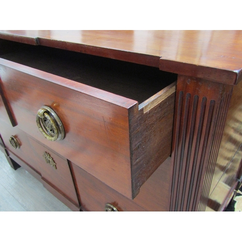 5486 - Circa 1800, a French mahogany breakfront commode chest of three graduating long drawers with oak lin... 