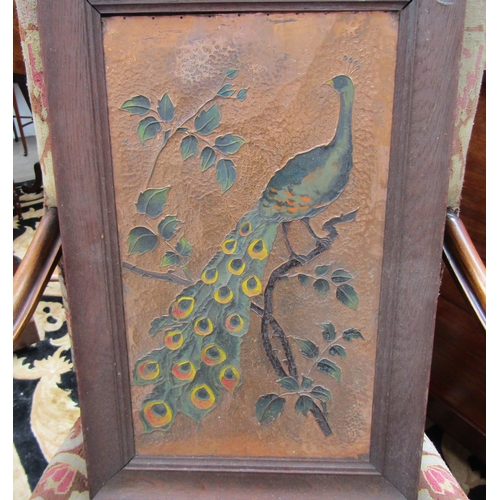 5488 - An early to mid 20th Century framed copper panel depicting a peacock of Arts & Crafts influence, 51c... 