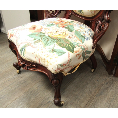 5489 - A Victorian oval back ladies open armchair with floral upholstery. Edging needs regluing. 102cm tall... 