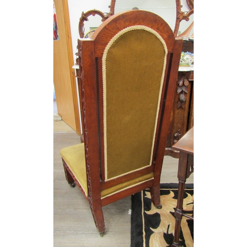 5494 - A late Victorian oak high back chair with highly ornate carving, velour upholstered back and seat  (... 