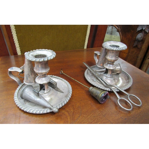 5495 - A pair of plated chamber sticks with wick trimmers and snuffer etc