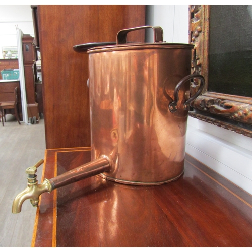 5678 - A 19th Century copper urn with lid, over iron handles and brass tap stamped 