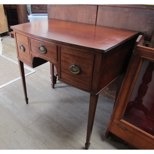 5684 - A Georgian mahogany bow front and side table/lowboy the reeded edge top over three drawers on spade ... 