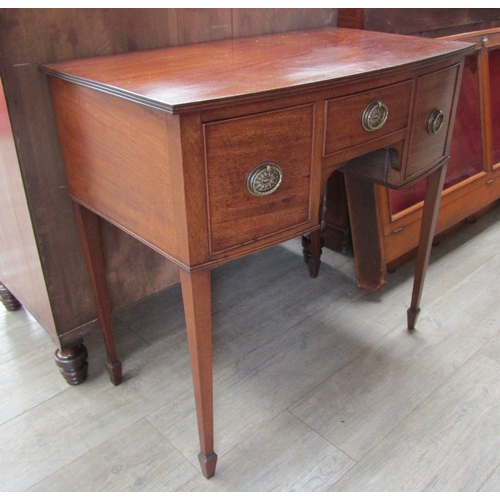 5684 - A Georgian mahogany bow front and side table/lowboy the reeded edge top over three drawers on spade ... 