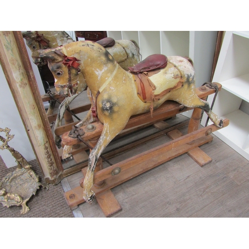 5686 - A late 19th Century/early 20th Century dapple rocking horse for restoration with later Triang Toys b... 