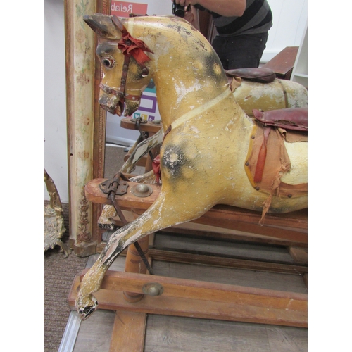 5686 - A late 19th Century/early 20th Century dapple rocking horse for restoration with later Triang Toys b... 