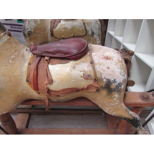 5686 - A late 19th Century/early 20th Century dapple rocking horse for restoration with later Triang Toys b... 